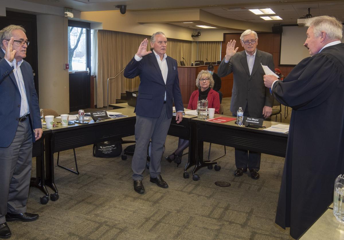 Commissioners swear in at the January commission meeting. 